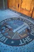 The seal of the University of Idaho in tile